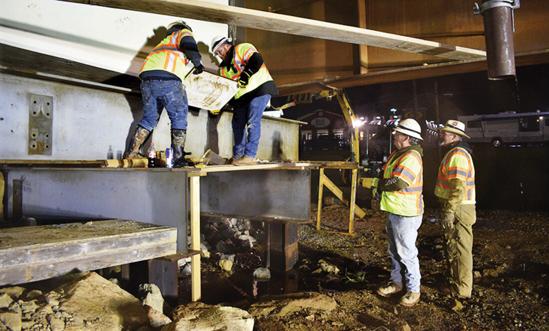 Sliding into Place Workers positioning Colonel Ruby Bradley Bridge in